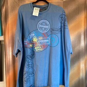 Disney parks‎ blue xxxl 62” chest size is worn off Passport stamps. 158